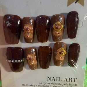 Brown Nail Art with Cute Capybara Design